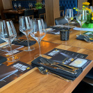 Table setting at restaurant for event with brochures 