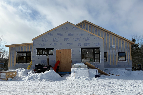 House under construction in the winter