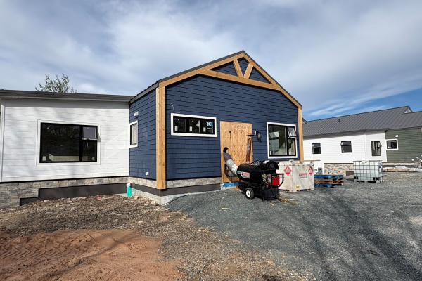 Photo of two homes under construction